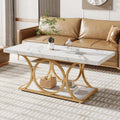 Table basse rectangulaire avec plateau effet marbre, rangement à deux niveaux et pieds géométriques dorés